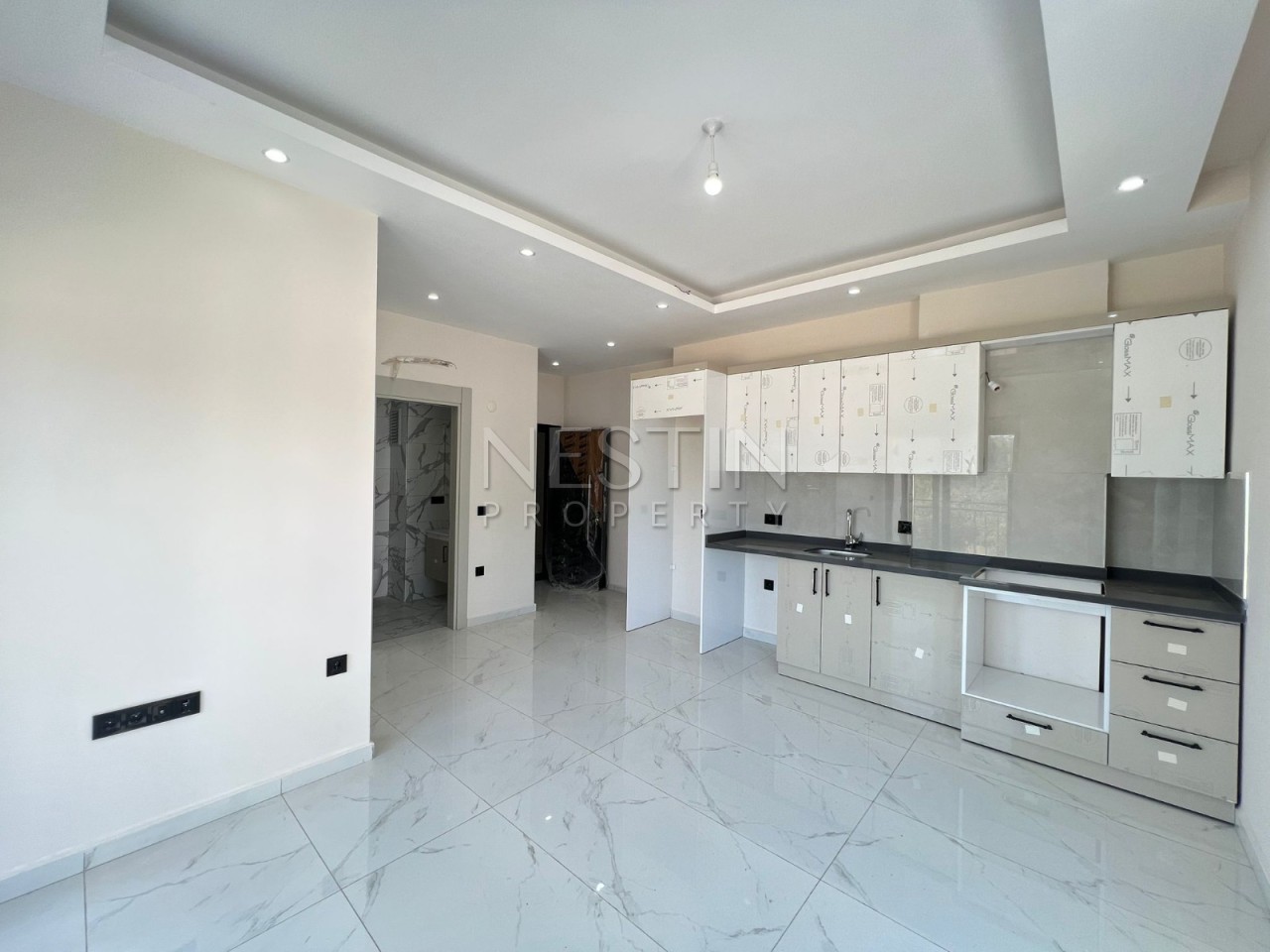 Готовая новая квартира 1+1 в районе Оба фото 13