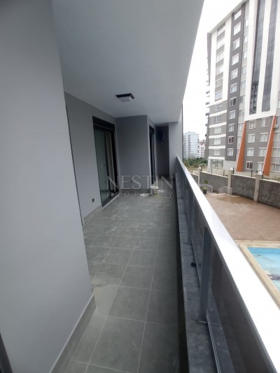 Новая большая квартира 2+1 с отдельной кухней в Махмутларе фото 24