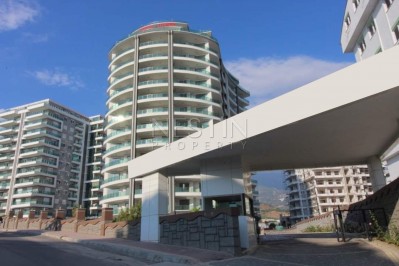 Просторные апартаменты 1+1 в жилом комплексе в районе Махмутлар фото 2