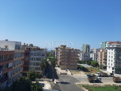 Квартира 2+1 в центре Махмутлара в 200 м от моря на срочной продаже фото 22
