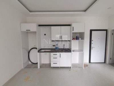 Квартира 1+1 в новом доме возле античного города Наула в Махмутларе фото 13