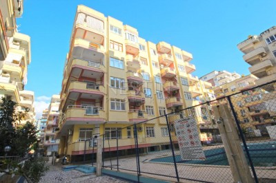 Большая квартира 3+1 в доме городского типа в центре Махмутлара фото 1