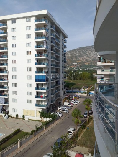 Просторная квартира 2+1 с мебелью в новом комплексе в Махмутларе фото 16