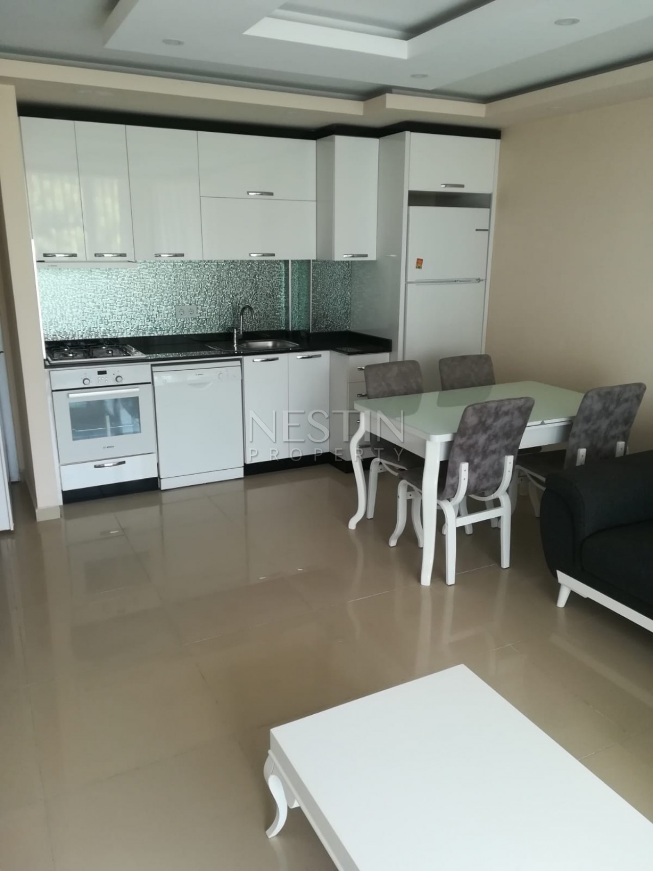 Квартира 1+1 с мебелью в новом комплексе в самом центре Махмутлара фото 14