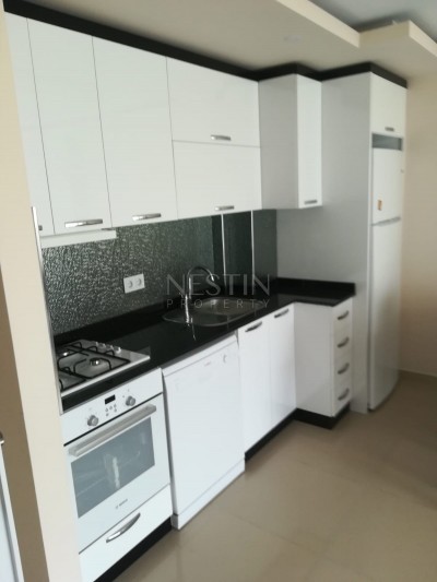 Квартира 1+1 с мебелью в новом комплексе в самом центре Махмутлара фото 13