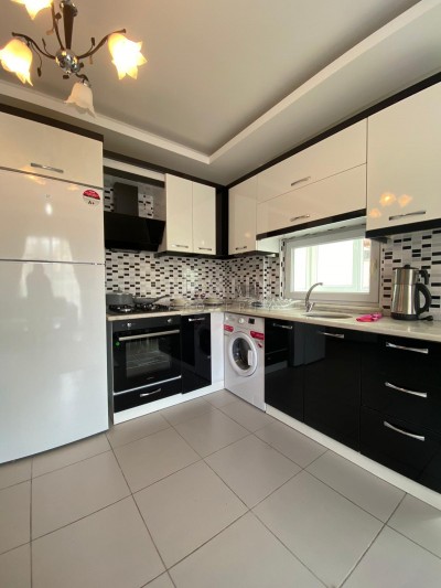 Апартаменты 1+1 в новом доме в Махмутларе по низкой цене фото 6