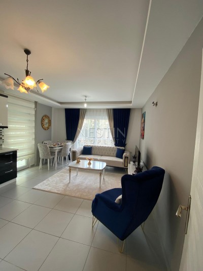 Апартаменты 1+1 в новом доме в Махмутларе по низкой цене фото 7