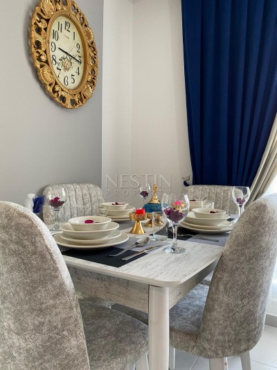 Апартаменты 1+1 в новом доме в Махмутларе по низкой цене фото 9