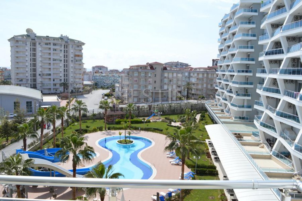 Квартира 1+1 с мебелью в престижном комплексе класса Люкс в Джикджилли фото 9