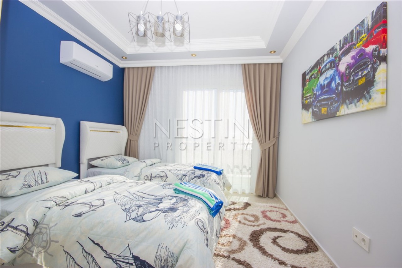 Квартира 2+1 с дизайнерской мебелью в центре Алании, вид на пляж Клеопатры фото 11