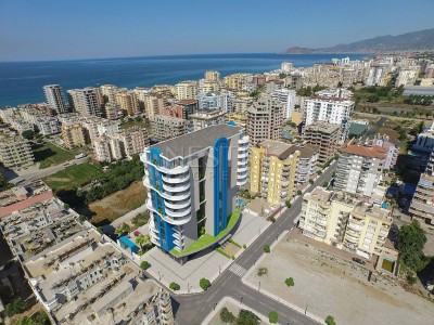 Апартаменты 1+1 в новом комплексе с видом на море в центре района Махмутлар фото 2