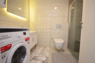 Апартаменты 1+1 в новом комплексе с видом на море в центре района Махмутлар фото 20