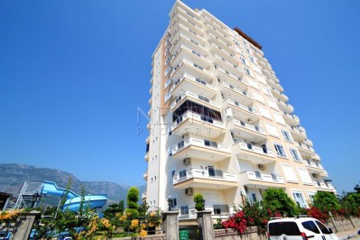 Большие апартаменты 2+1 в новом комплексе в Махмутларе фото 2