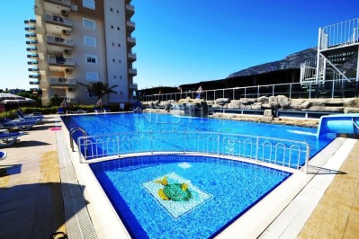 Большие апартаменты 2+1 в новом комплексе в Махмутларе фото 1