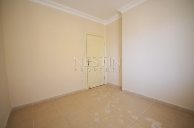 Большие апартаменты 2+1 в новом комплексе в Махмутларе фото 18