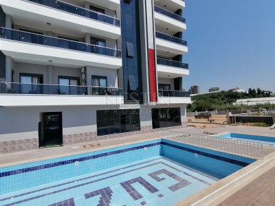 Очень просторная квартира с отдельной кухней 2+1 с видом на море в Махмутларе фото 3