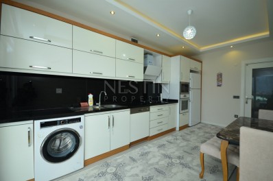 Квартира 2+1 с мебелью и отдельной кухней в районе Махмутлар фото 14