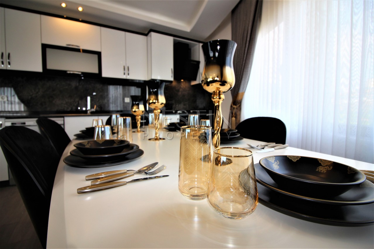 Просторный двухэтажный пентхаус 4+1 с панорамным видом на море в Махмутларе фото 5