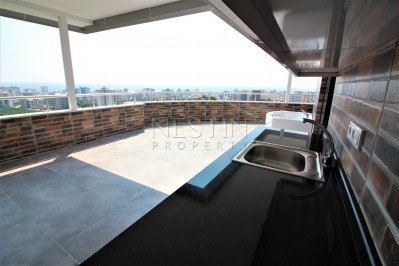 Просторный двухэтажный пентхаус 4+1 с панорамным видом на море в Махмутларе фото 10