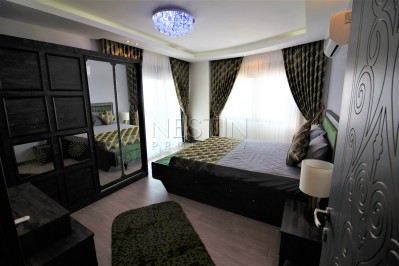 Просторный двухэтажный пентхаус 4+1 с панорамным видом на море в Махмутларе фото 25