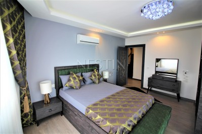 Просторный двухэтажный пентхаус 4+1 с панорамным видом на море в Махмутларе фото 27