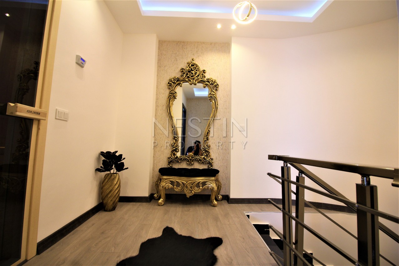 Просторный двухэтажный пентхаус 4+1 с панорамным видом на море в Махмутларе фото 21