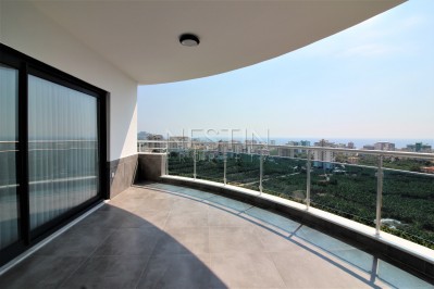 Просторный двухэтажный пентхаус 4+1 с панорамным видом на море в Махмутларе фото 9