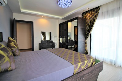 Просторный двухэтажный пентхаус 4+1 с панорамным видом на море в Махмутларе фото 31