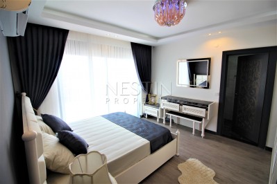 Просторный двухэтажный пентхаус 4+1 с панорамным видом на море в Махмутларе фото 34