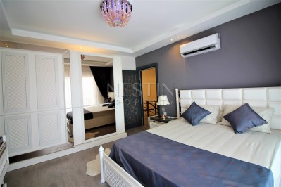 Просторный двухэтажный пентхаус 4+1 с панорамным видом на море в Махмутларе фото 36