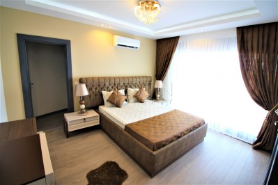 Просторный двухэтажный пентхаус 4+1 с панорамным видом на море в Махмутларе фото 37