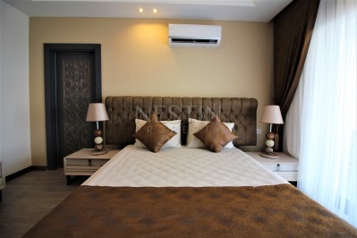 Просторный двухэтажный пентхаус 4+1 с панорамным видом на море в Махмутларе фото 38