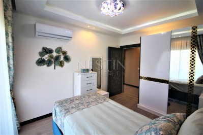 Просторный двухэтажный пентхаус 4+1 с панорамным видом на море в Махмутларе фото 39