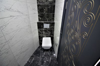 Просторный двухэтажный пентхаус 4+1 с панорамным видом на море в Махмутларе фото 41