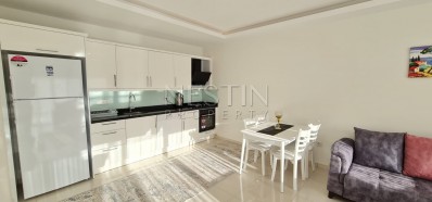 Просторная квартира 1+1 в новом комплексе в районе Махмутлар фото 18
