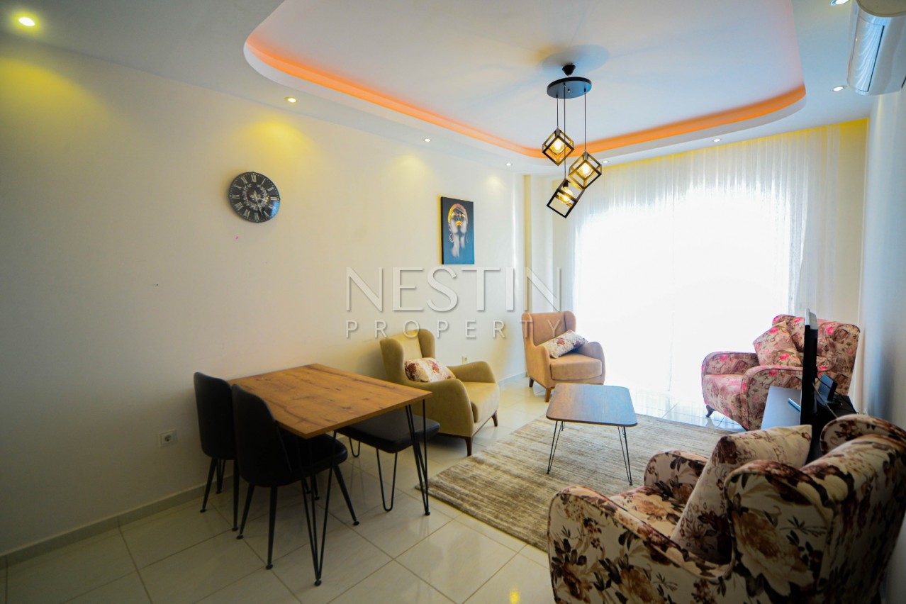 Красивая квартира 1+1 от надежного застройщика с видом на море в Махмутлар фото 8