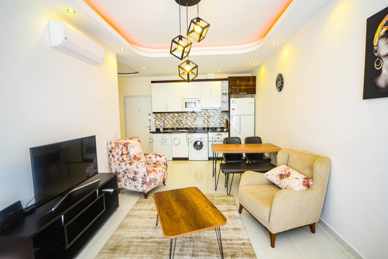 Красивая квартира 1+1 от надежного застройщика с видом на море в Махмутлар фото 9