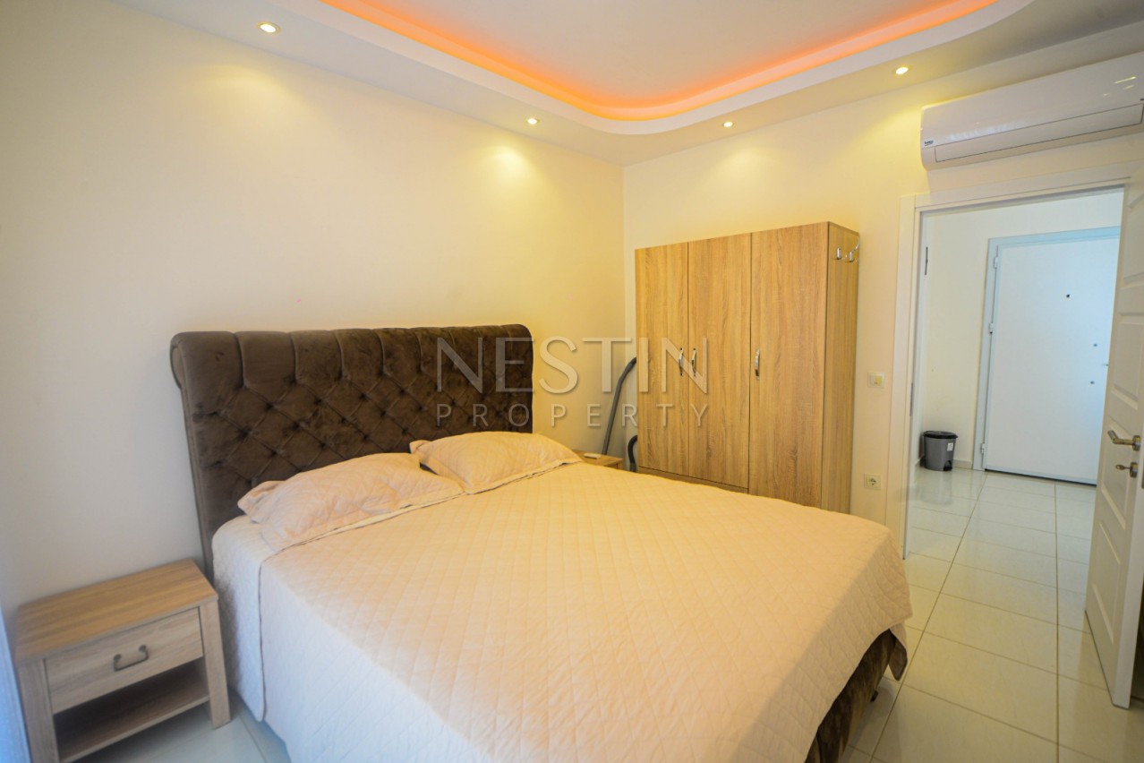 Красивая квартира 1+1 от надежного застройщика с видом на море в Махмутлар фото 11