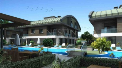 Апартаменты в строящемся доме в районе Муратпаша фото 1