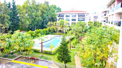 Светлая квартира в доме с инфраструктурой и большим садом в Коньяалты фото 1