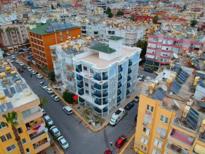 Новая квартира 1+1 в самом центре города Алании в 100 м от моря фото 1