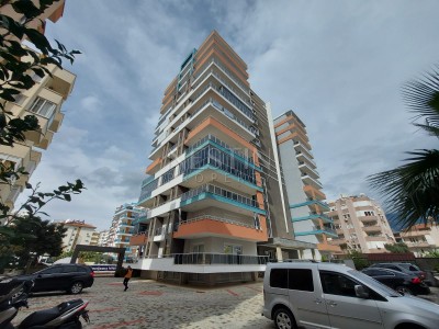 Квартира 1+1 в районе Махмутлар с видом на море фото 1