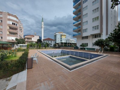 Квартира 1+1 в районе Махмутлар с видом на море фото 3