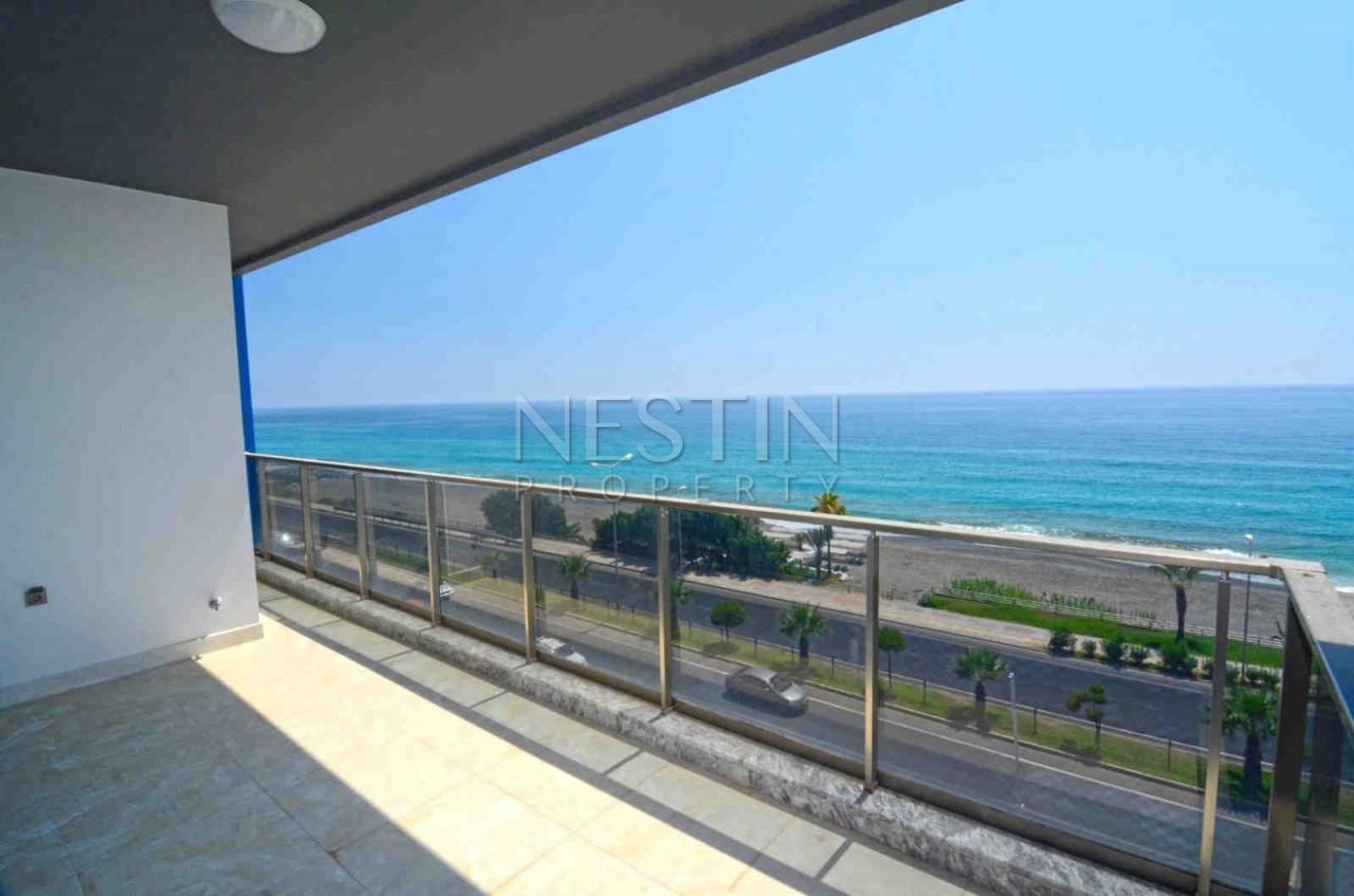 Квартира 2+1 в новом доме на берегу моря в Махмутларе фото 2