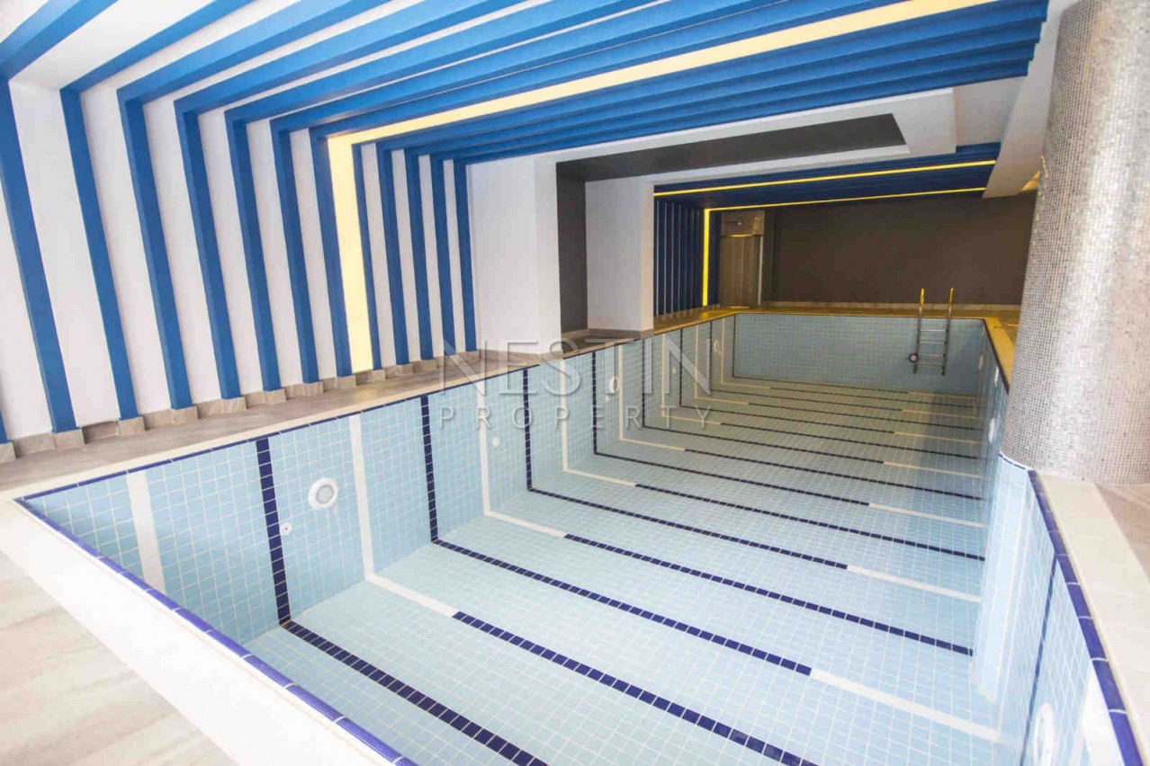 Квартира 2+1 в новом доме на берегу моря в Махмутларе фото 6