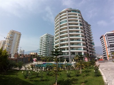 Квартира 1+1 в новом комплексе в 600 м от моря в Махмутларе фото 1