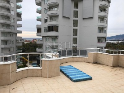 Вилла 4+1 в центре района Махмутлар с видом на Торосские горы фото 11