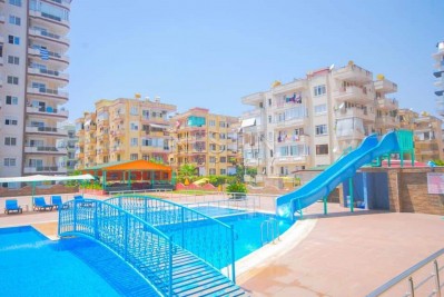 Квартира 1+1 с мебелью в современном комплексе в Махмутларе фото 2
