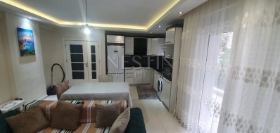 Апартаменты 1+1 в районе Махмутлар в 300 метрах от моря фото 1