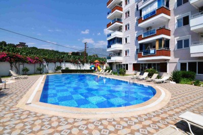 Новый комплекс от надежного застройщика в зеленой части Махмутлара фото 1